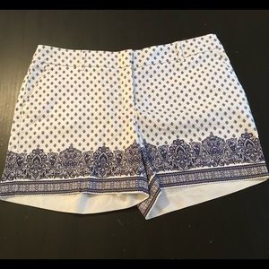 White with blue pattern Size 6 shorts. Never worn